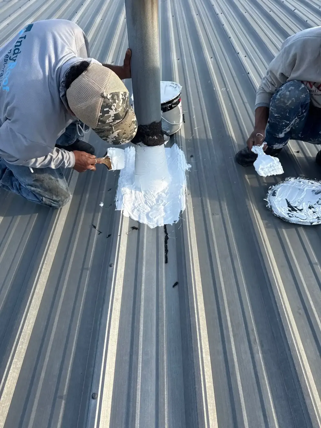 Tarping and dry-in on a Lapel commercial roof